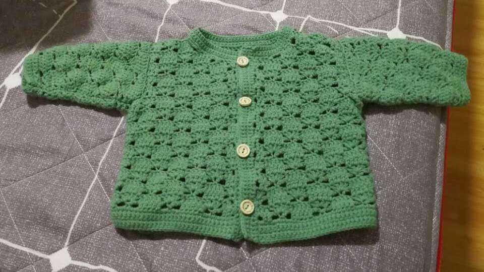 A Chinese mom hired an American surrogate to carry her child. She crocheted baby sweaters while she waited